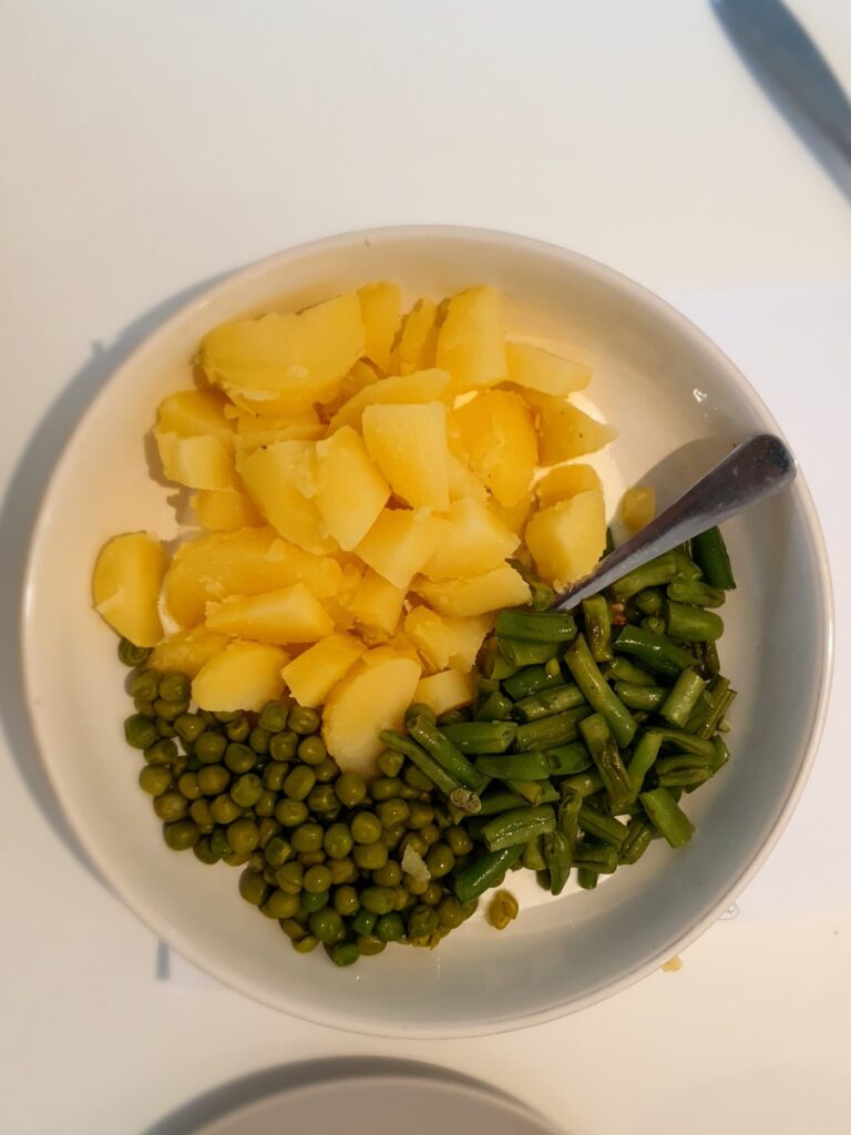 Mixing the potato salad