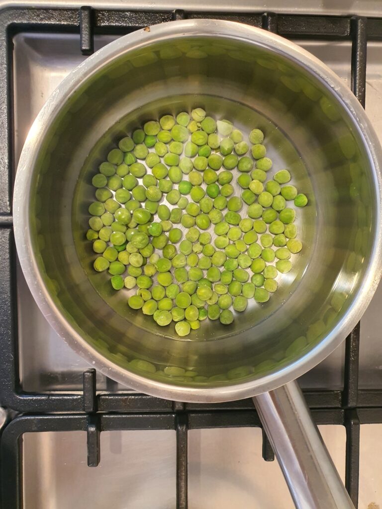Peas boiling in a pot