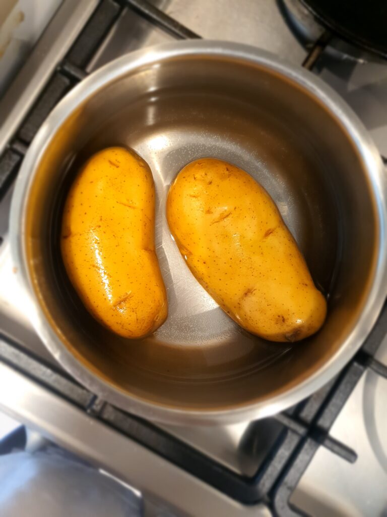 Potatoes boiling in a pot